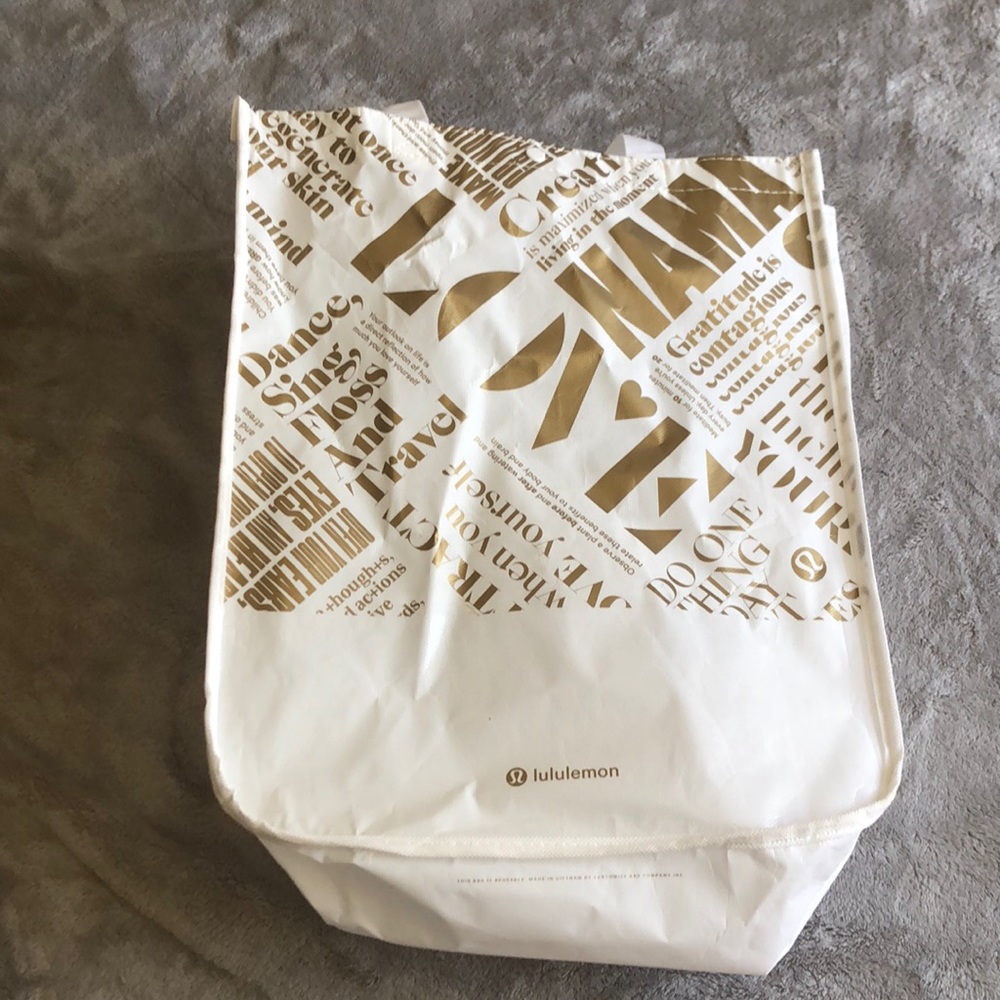 large white and gold lulu bag